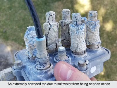 An extremely corroded tap due to salt water from being near an ocean