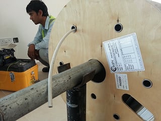 engineer installing Miniflex